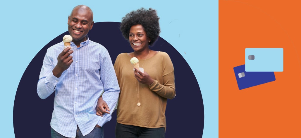 Young couple shares a laugh while having ice cream together